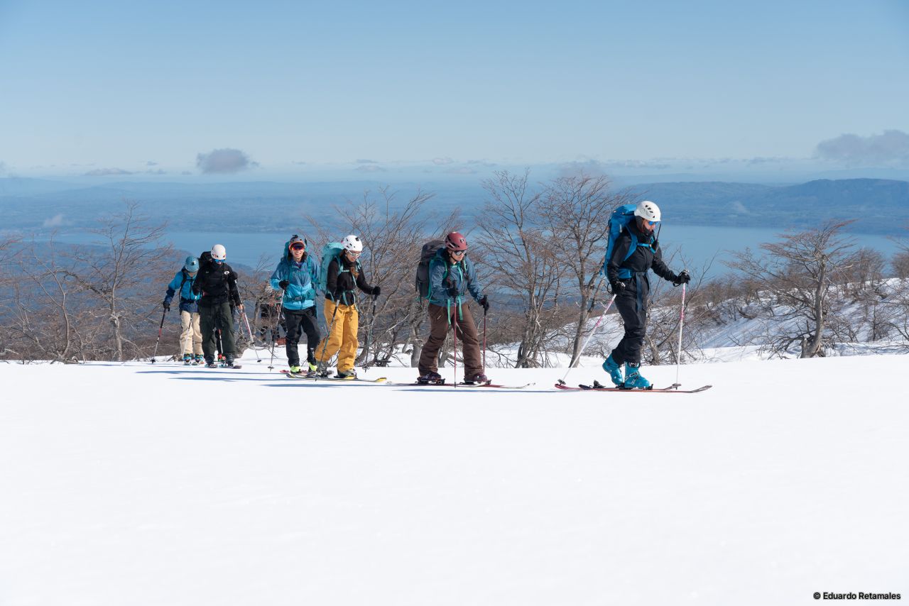 Leaving the lenga forest in the middle of winter. Lake Villarrica in the background.